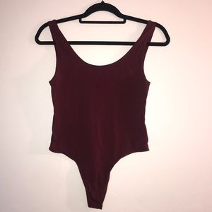 maroon body suit